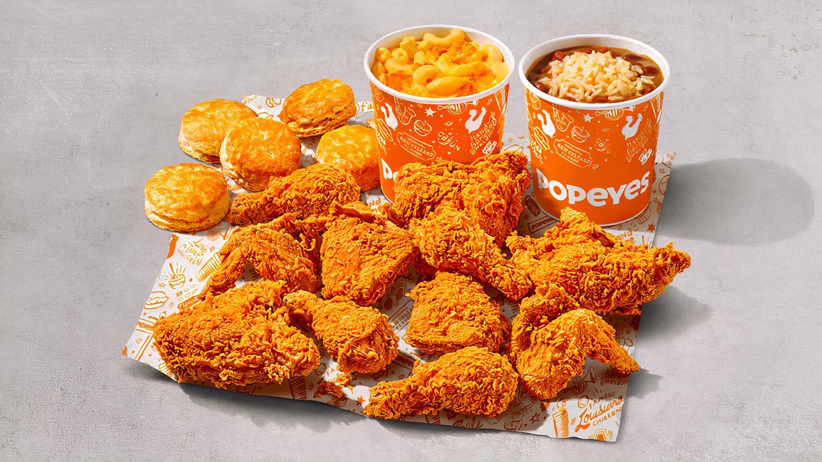 Popeyes serving chicken wings dipped in champagne and gold flakes